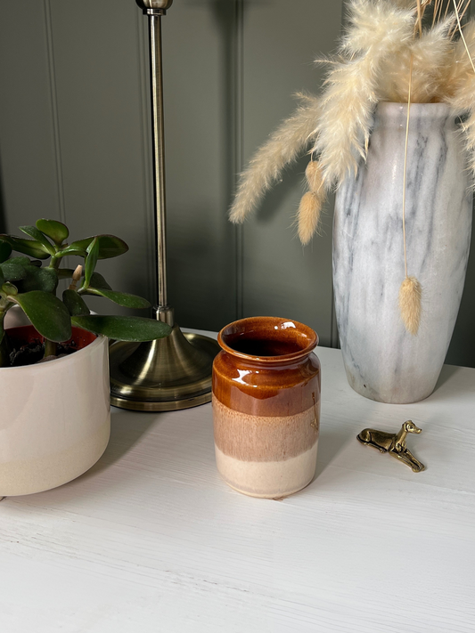 Handmade vintage pottery jug or vase with dipped cream and brown finish