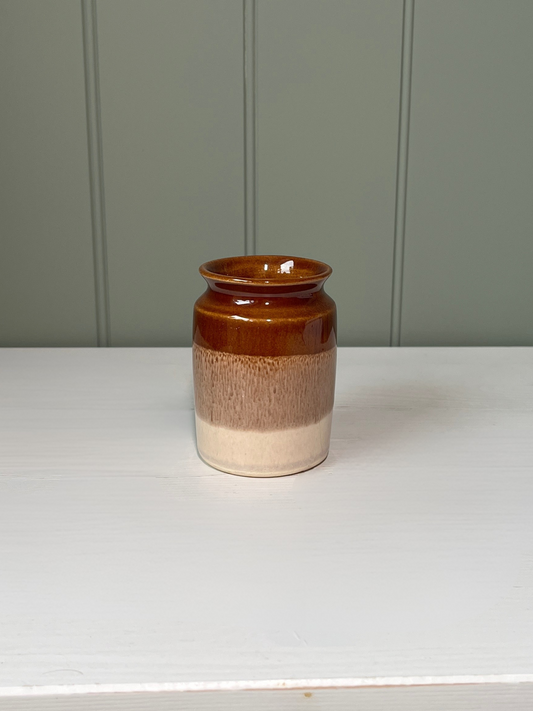 Handmade vintage pottery jug or vase with dipped cream and brown finish