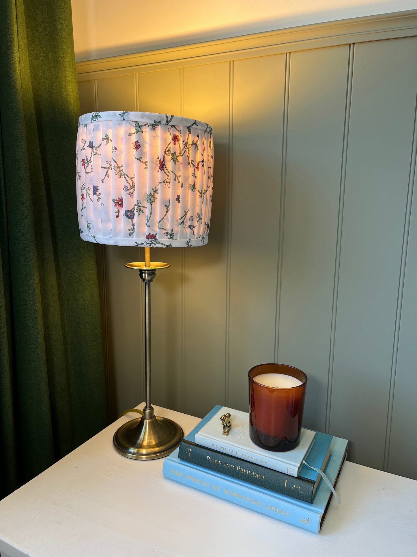 Pleated lampshade with white, red and blue floral fabric